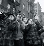 Blowing horns on Bleeker Street on New Year's Day